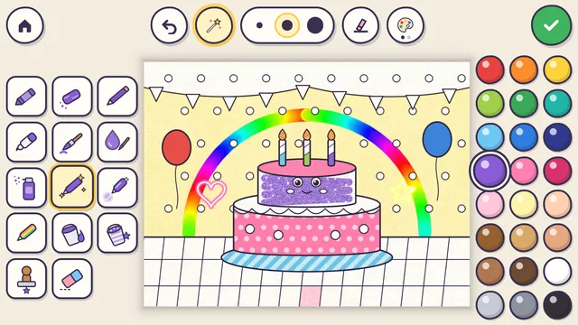 A birthday cake colored with the glitter pen and the rainbow pen