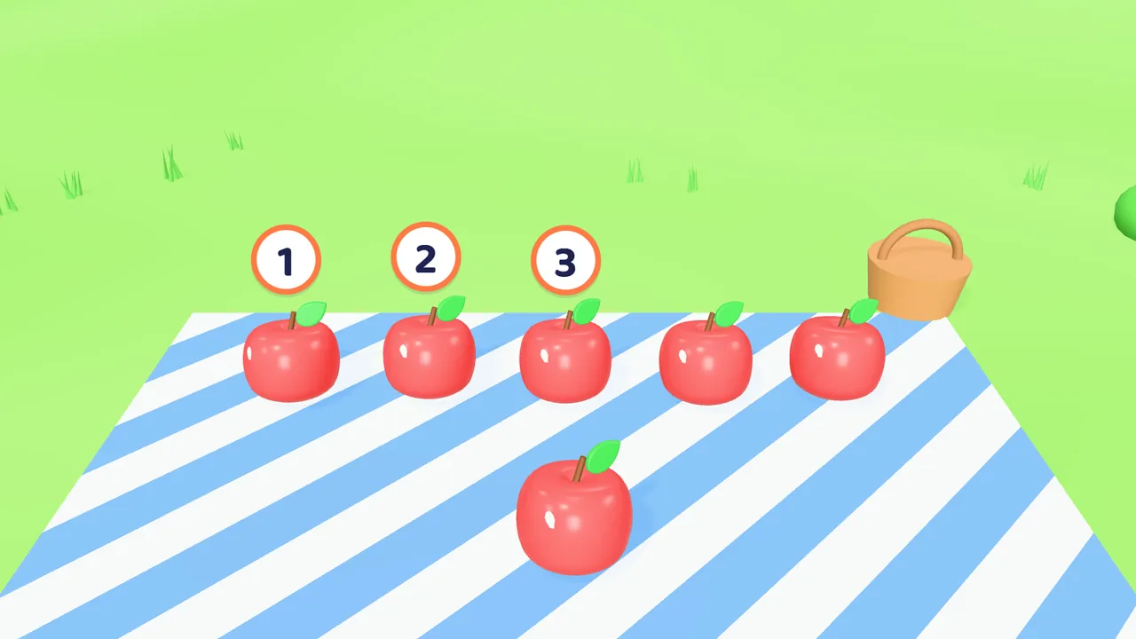 Piknik örtüsündeki elmalar sayılıyor: 1, 2, 3